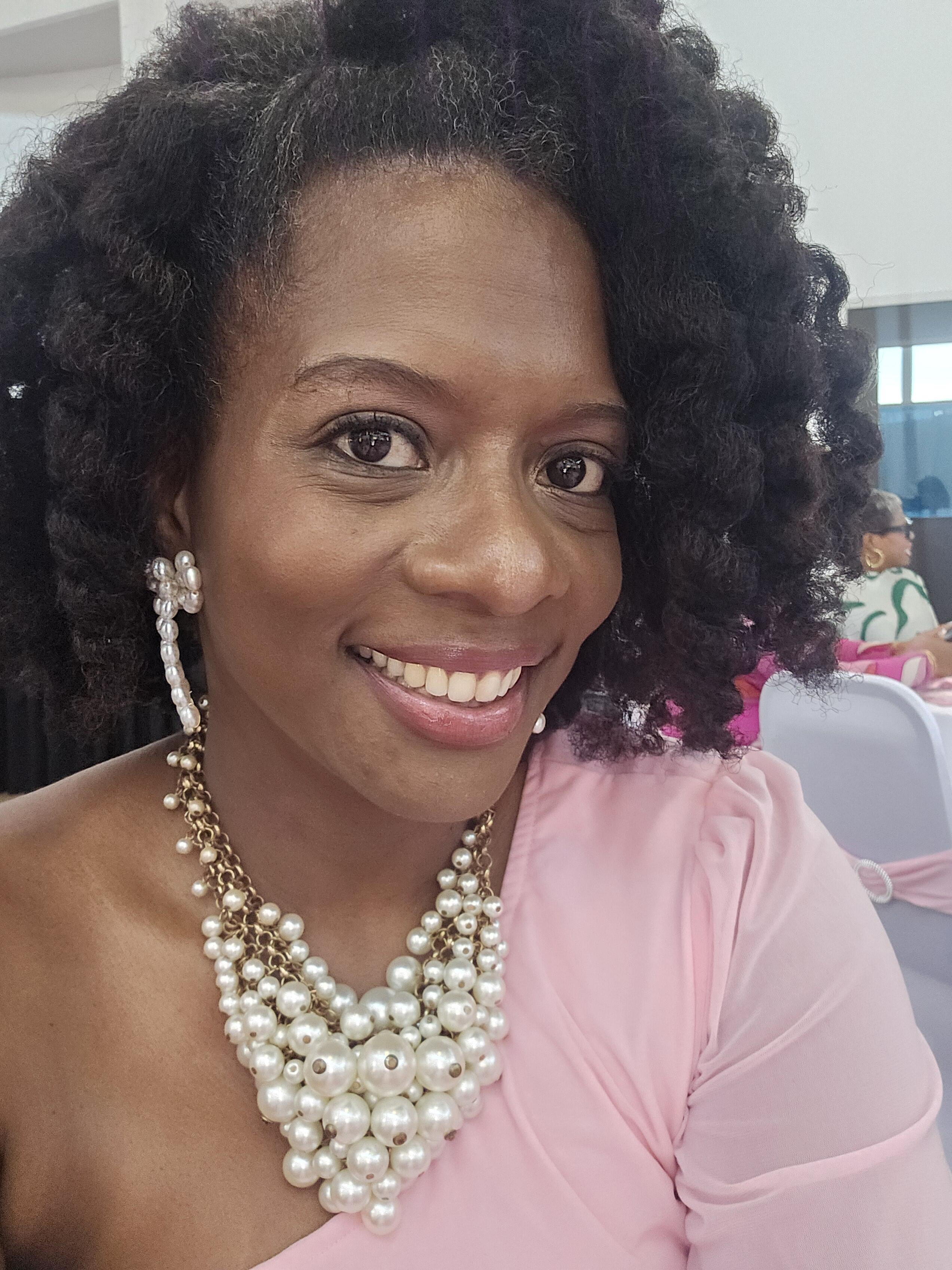 Asueleni Deloney logo