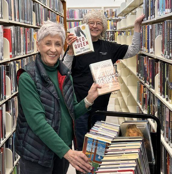 Friends members helping MBCPL staff to prepare the library for re-opening.