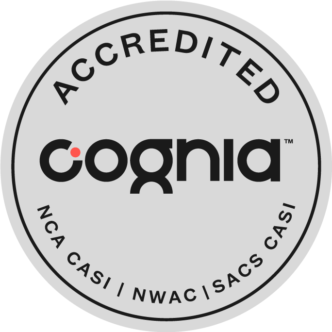 Round gray symbol showing Cognia AdvancED School Accreditation