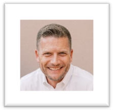 A person smiling at the cameraAI-generated content may be incorrect.