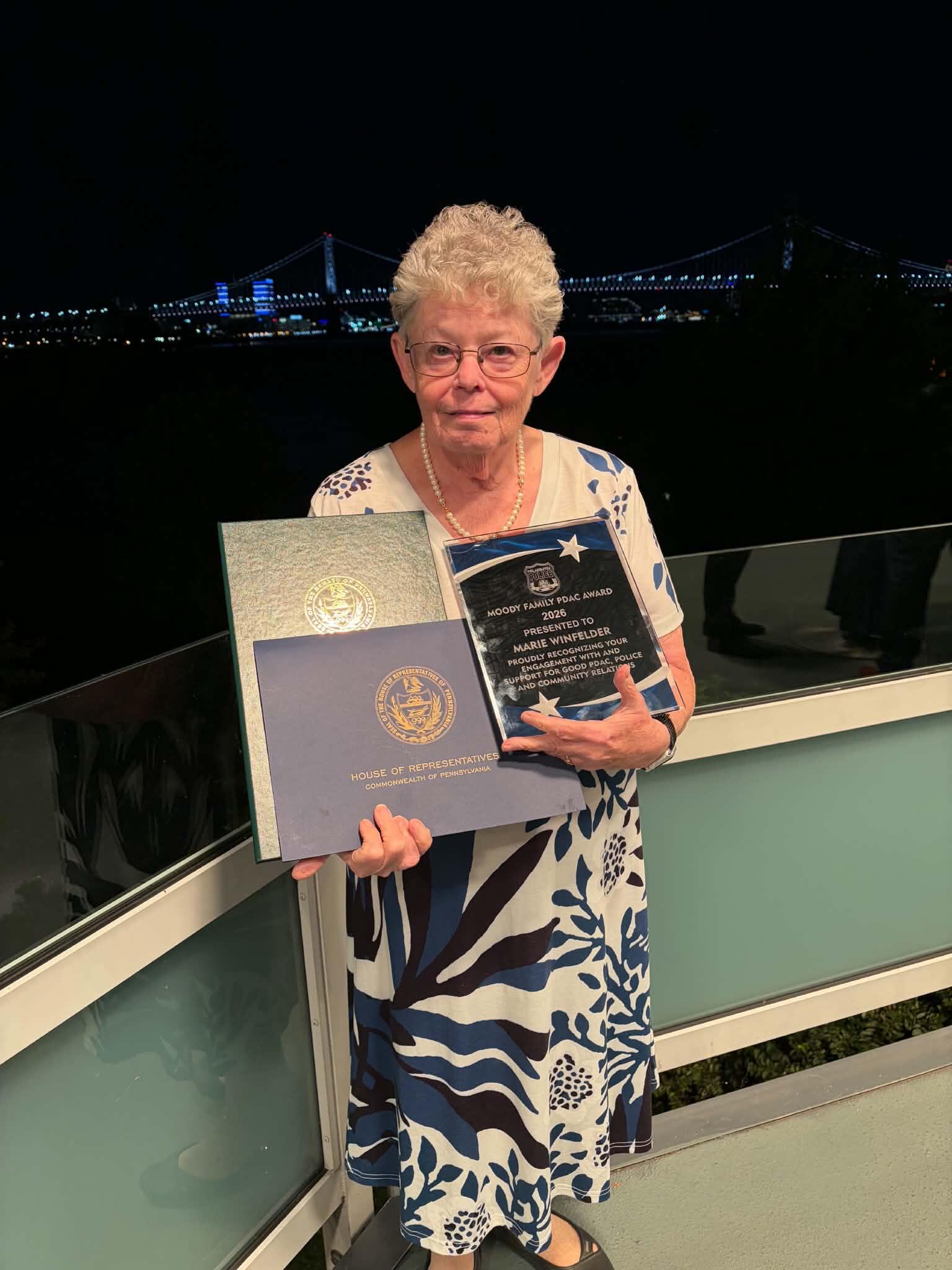 Photo of Marie Windfelder winning PDAC Award