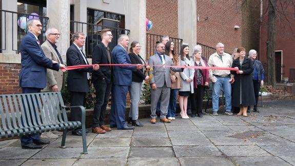 The Ribbon cutting ceremony in-front of the Downtown Martinsburg Library during re-opening festivities.