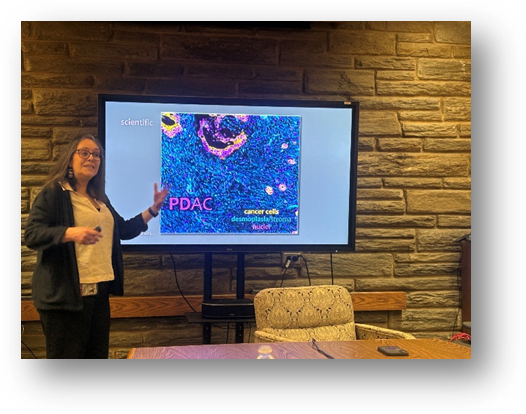 A person standing in front of a screenAI-generated content may be incorrect.